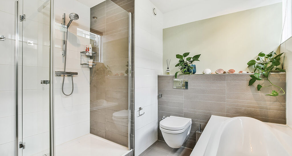 500mm glass shower screen in a compact minimalist bathroom