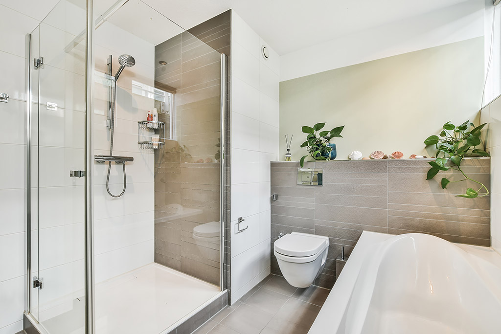 500mm glass shower screen in a compact minimalist bathroom