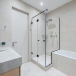 bathtub with half glass