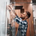 misaligned frameless shower door